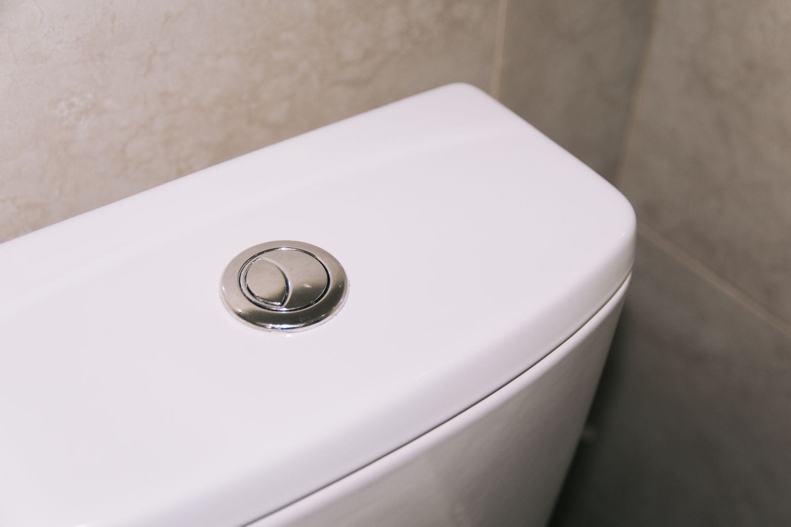 Bouton chasse d'eau double touche