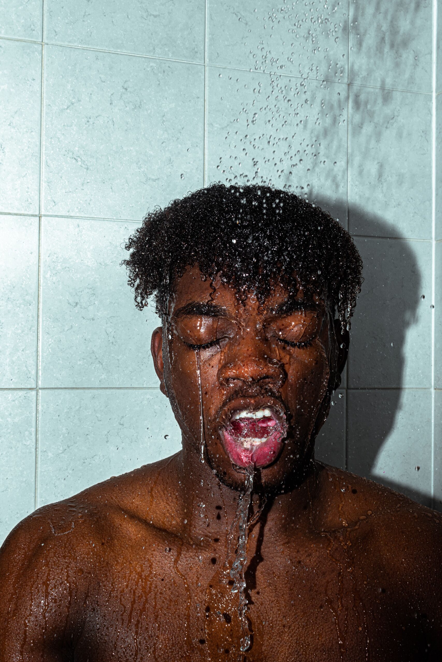 Réducteur de débit installé dans un pommeau de douche